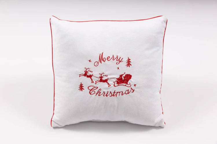 Świąteczna poduszka dekoracyjna 40x40 cm z welwetu cegiełki z haftem reniferów i napisem Merry Christmas oraz antyalergicznym wypełnieniem
