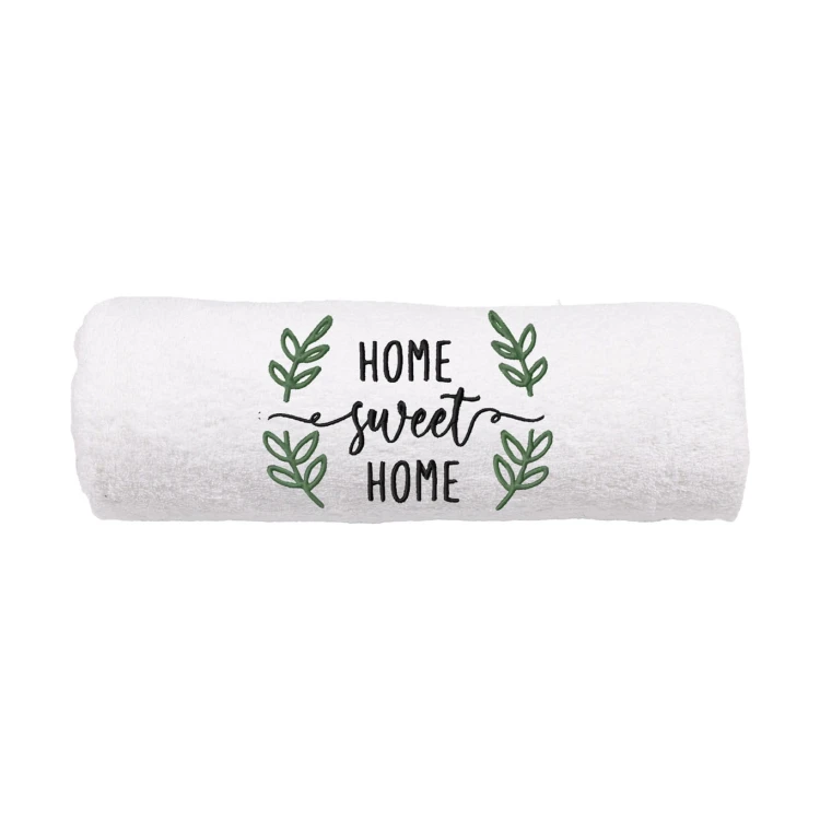Biały ręcznik z haftem Home Sweet Home.