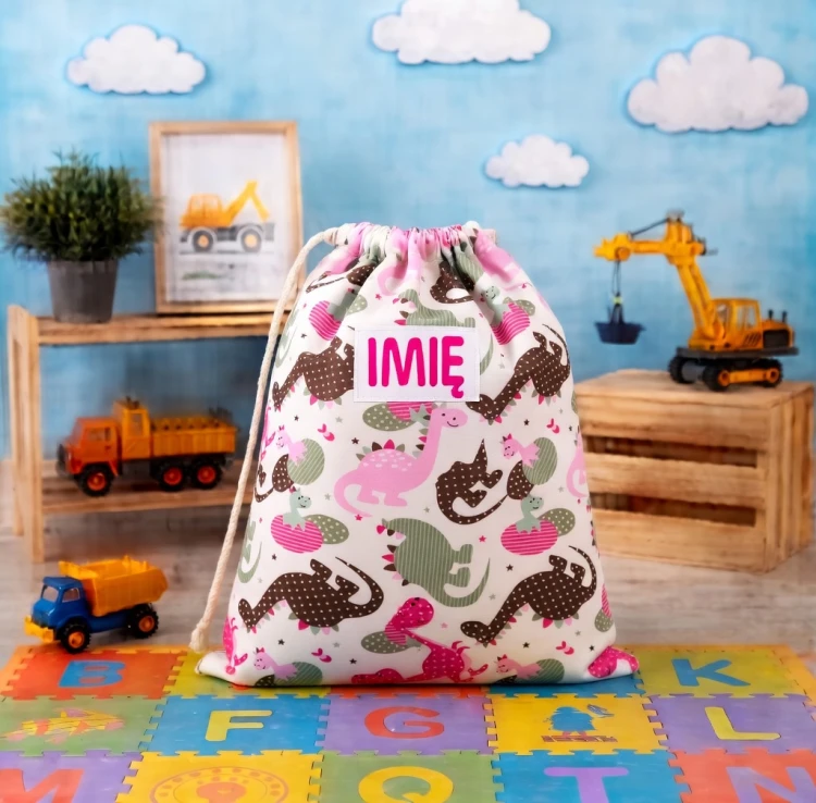 Duży bawełniany worek na pościel do przedszkola 50x60 cm, wzór w dinozaury, pasujący do kompletu pościeli z personalizowanym haftem.